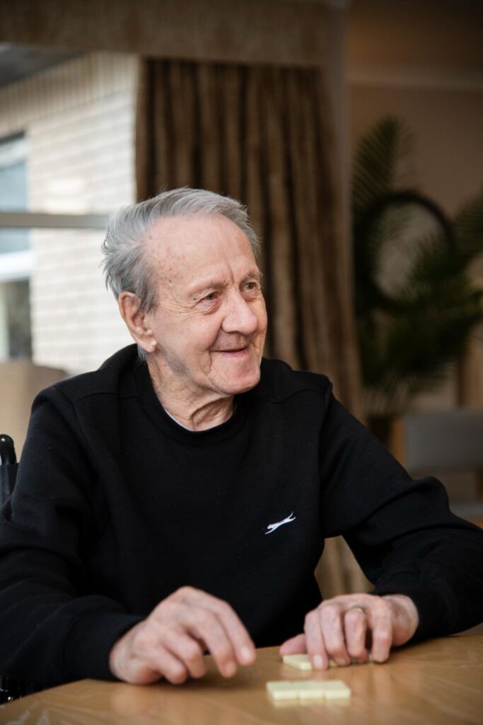 Male residents playing dominoes
