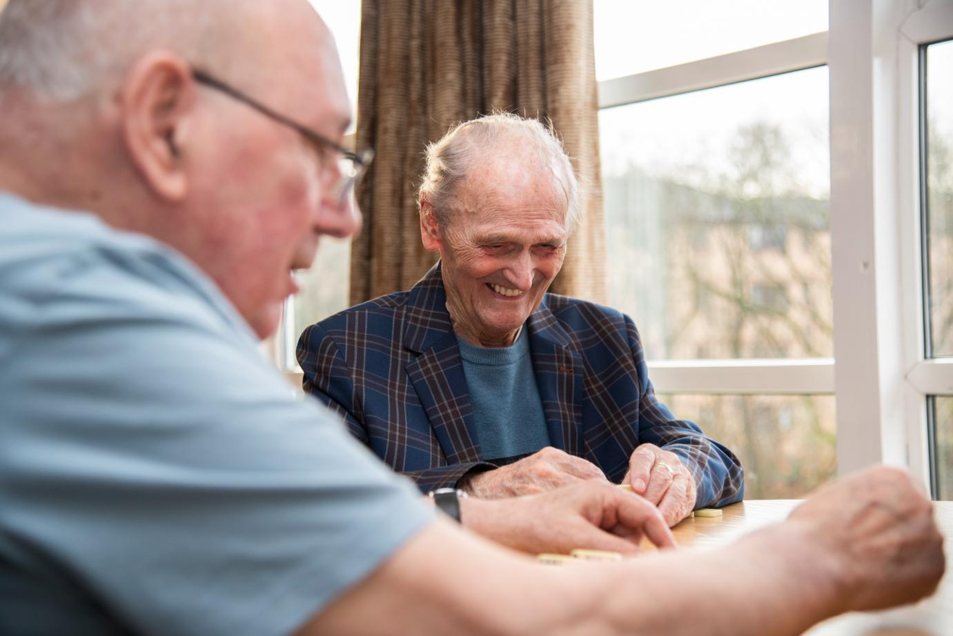 Residents playing dominoes