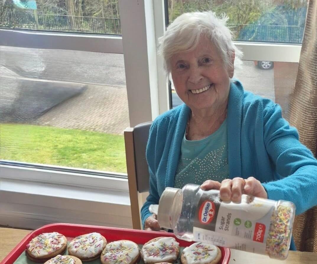 resident decorating cookies